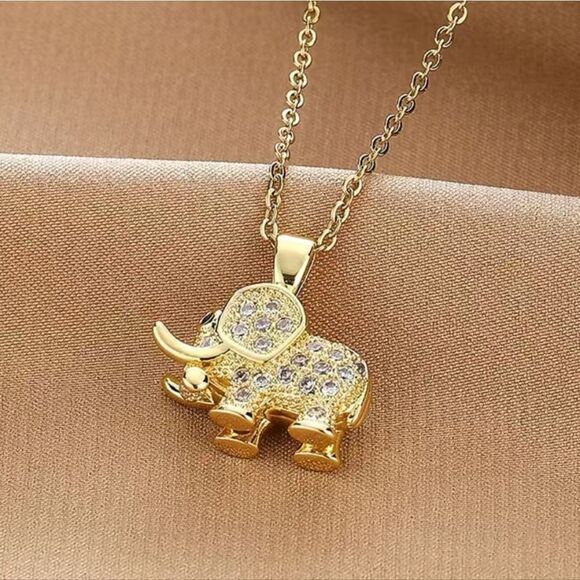 Stainless Steel Elephant Pendant Necklace in Gold Tones and embedded Zirconia - Picture 5 of 11